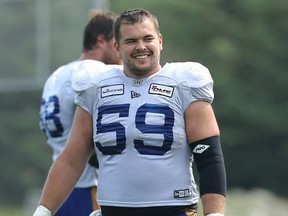 Offensive lineman Michael Couture at a Blue Bombers practice in July 2021. ‘We had a great thing in Winnipeg, but I always kind of had it in the back of my mind that this would be a place that I’d like to be my next chapter,’ says the Burnaby native, who signed with his hometown Lions on Tuesday.
