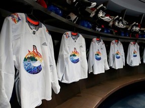 Vancouver Canucks Pride jerseys hang in the dressing room before their NHL game against the Washington Capitals at Rogers Arena on March 11, 2022.