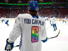 Brock Boeser of the Vancouver Canucks warms up in his You can play Pride night jersey before their NHL game against the Calgary Flames at Rogers Arena March 31, 2023. Andrei Kuzmenko was the only Canucks player to not wear the jersey.
