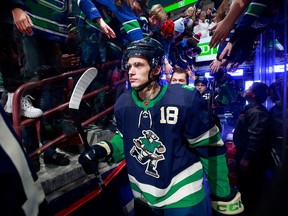 Jack Studnicka of the Vancouver Canucks walks out to the ice before their game against the St. Louis Blues at Rogers Arena on Dec. 19, 2022.