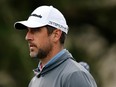 NFL quarterback Aaron Rodgers walks from the first tee during the third round of the AT&T Pebble Beach Pro-Am at Pebble Beach Golf Links on Feb. 4, 2023 in Pebble Beach, Calif.