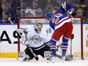 Jonathan Quick #32 of the Los Angeles Kings makes the first period save on Jimmy Vesey #26 of the New York Rangers at Madison Square Garden on February 26, 2023 in New York City.