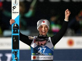Gold medalist Alexandria Loutitt of Canada celebrates during the victory ceremony for the Ski Jumping Women's Individual HS138 at the FIS Nordic World Ski Championships Planica on March 01, 2023 in Planica, Slovenia.