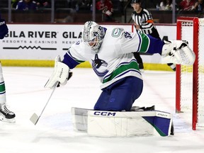 Thatcher Demko of the Vancouver Canucks makes a save against the Arizona Coyotes during the first period at Mullett Arena on March 16, 2023 in Tempe, Arizona.