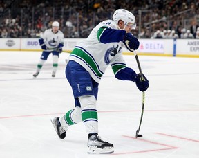 Elias Pettersson of the Vancouver Canucks scores on his shot, to tie the game 2-2 with the Los Angeles Kings during the third period at Crypto.com Arena on March 18, 2023 in Los Angeles.