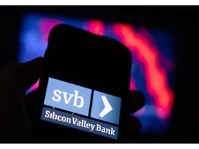The Silicon Valley Bank logo on a smartphone arranged in Riga, Latvia, on Friday, March 10, 2023. Panic spread across the startup world as worries about the financial health of Silicon Valley Bank, a major lender to fledgling companies, prompted Peter Thiel's Founders Fund and other prominent venture capitalists to advise portfolio businesses to withdraw their money, even as the bank's top executive urged calm. Photographer: Andrey Rudakov/Bloomberg