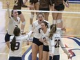 The UBC Thunderbirds celebrate during their national semifinal win over the Manitoba Bisons on Saturday at War Memorial Gymnasium. UBC, who are the No. 7 seeds and tournament hosts, face the No. 1 seeds and defending champion Trinity Western University Spartans in today's championship match.