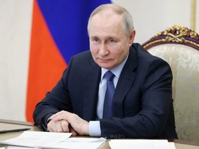 Russian President Vladimir Putin chairs a meeting on the social and economic development of Crimea and Sevastopol, via videolink in Moscow, Friday, March 17, 2023.