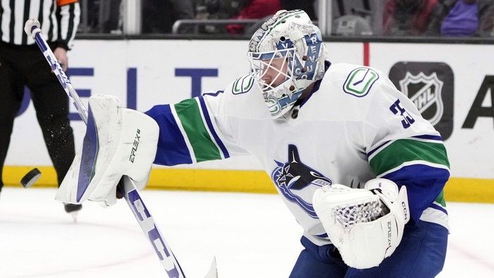 Vancouver Canucks goaltender Thatcher Demko (35) stops a shot against the Los Angeles Kings during the second period of an NHL hockey game Saturday, March 18, 2023, in Los Angeles.