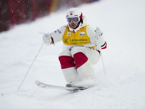 Canada's Mikael Kingsbury skis in the qualification run of the men's freestyle ski world cup moguls at Val Saint-Come, Que., Jan. 27, 2023. Kingsbury won the final dual moguls World Cup event of the year en route to claiming his third Crystal Globe this season on Saturday.