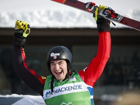 Canada's Reece Howden celebrates his first place finish following the men's final at the World Cup ski cross event at Nakiska Ski Resort in Kananaskis, Alta., Saturday, Jan. 18, 2020. Howden led from start to finish to win gold at the skicross World Cup Finals on Friday and secure the crystal globe as the overall season leader.