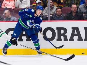 Canucks winger Vitali Kravtsov fires the puck toward the Dallas Stars net during a March 14, 2023 NHL game at Rogers Arena.