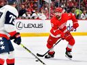 Detroit Red Wings defenseman Filip Hronek (17) looks to pass against the Washington Capitals during the second period at Capital One Arena. Brad Mills-USA TODAY Sports