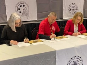 The Splatsin First Nation became the first Indigenous community in B.C. to take control of its child-welfare system under new federal and provincial legislation, during a ceremony in Enderby on Friday. From left, Patty Hajdu, federal minister of Indigenous services, Splatsin Kukpi7 Chief Doug Thomas, and Mitzi Dean, B.C.'s minister of children and family development.