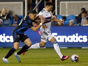 San Jose Earthquakes forward Cristian Espinoza chases Vancouver Whitecaps defender Luís Martins during the first half of an MLS soccer match in San Jose, Calif., Saturday, March 4, 2023.