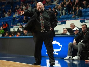 West Vancouver Highlanders coach Paul Eberhardt makes a point during a game against the Terry Fox Ravens at the B.C. boys' basketball provincials in the Langley Events Centre on March 7.