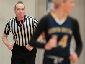 A referee in action during the B.C. provincial basketball tournament at the Langley Events Centre on March 2.