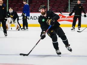 Defenceman Filip Hronek practising with his new Vancouver Canucks teammates on March 21, 2023. He hurt his shoulder with the Detroit Red Wings before being traded to Vancouver.