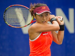 Misaki Doi of Japan hits to Heather Watson during women's tennis final at Odlum Brown VanOpen at Hollyburn Country Club in West Vancouver, BC, August 19, 2018.  (Arlen Redekop / PNG staff photo)