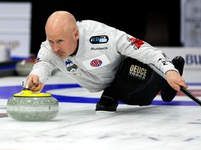 Skip Kevin Koe takes a shot during the Men's Curling Provincial Championship finals against Team Bottcher at the River Cree, Sunday Feb. 12, 2023.