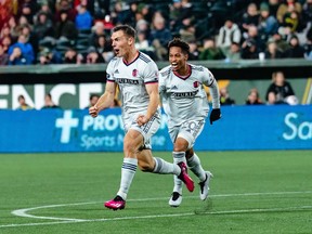 Canadian defender Kyle Hiebert celebrates after scoring the winning goal in expansion St. Louis City FC's 2-1 win over the Portland Timbers on March 11, 2022 in Portland, Ore.