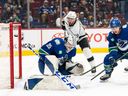 Alex Iafallo of the Los Angeles Kings watches the puck go into the net during the second period at Rogers Arena on Sunday night.