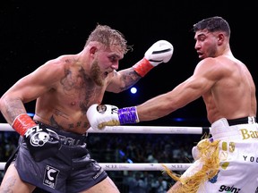 Tommy Fury punches Jake Paul during the Cruiserweight Title fight between Jake Paul and Tommy Fury at the Diriyah Arena on February 26, 2023 in Riyadh, Saudi Arabia.