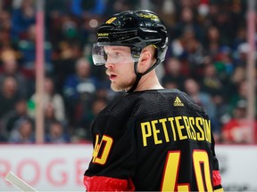 Elias Pettersson of the Vancouver Canucks in the team's "black skate" alternate uniform.