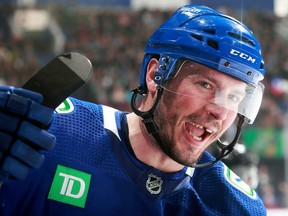 J.T. Miller of the Vancouver Canucks screams on the bench during a game against Chicago on April 6, 2023.