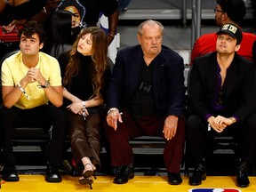 Movie star Jack Nicholson (second from right) courtside at Crypto.com Arena for the L.A. Lakers-Memphis Grizzlies Game 6 in their opening-round NBA playoff series on April 28, 2023 in Los Angeles.