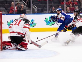 Team Canada’s goaltender Dylan Garand (31) stops Team Slovakia’s Dalibor Dvorsky (15) during third period during World Junior Hockey Championship action at Rogers Place in Edmonton, on Thursday, Aug. 11, 2022.