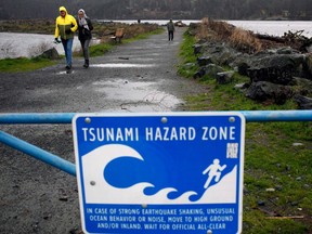 A tsunami warning near Sooke, on southern Vancouver Island. The latest seismic research tells us that, over the next half-century, there is a 30-per-cent chance of a major quake happening along the British Columbia coast, says Celyeste Power of the Insurance Bureau of Canada.