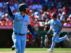 Apr 9, 2023; Anaheim, California, USA; Toronto Blue Jays center fielder Kevin Kiermaier reacts after hitting a two run RBI single against the Los Angeles Angels during the seventh inning at Angel Stadium.