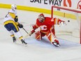 Nashville Predators forward Tommy Novak scores on Calgary Flames goaltender Jacob Markstrom for the decisive shootout goal at the Scotiabank Saddledome on Monday, April 10, 2023.