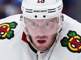 Chicago Blackhawks' Jonathan Toews waits for a faceoff during the third period of an NHL hockey game against the Vancouver Canucks in Vancouver, on Thursday, April 6, 2023. ;Longtime Blackhawks captain Toews will not be returning to Chicago next season, the team announced on Thursday.