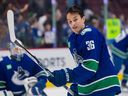 Vancouver Canucks defenseman Akito Hirose (36) skates during warmups in his NHL debut before a game against the Los Angeles Kings at Rogers Arena.