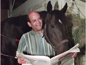 From the wayback machine: Randy Goulding, who has been a fixture at Hastings Racecourse for decades, checks out the picks in the Racing Form with a rather nosy ‘nag’ running interference in 1998.