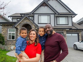 Shaun Francis with his wife Lida Francis and sons Arie, 4, and Eli 2, at their home in Langley.