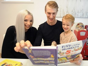 Vancouver Canucks defenceman Tyler Myers and his wife Michela read to their son Tristan. The couple, who recently welcomed daughter Skylar to the fold, are loving life in Vancouver.