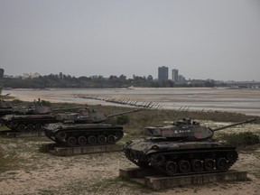 Tanks used by the Taiwan military are seen on display for tourists at a beach on April 8, 2023 in Kinmen, Taiwan. Kinmen, an island in the Taiwan strait that is part of Taiwan's territory, is so close to China that the deep-water port of Xiamen, one of China's biggest, lies less than three miles away across the water.