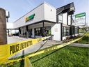 Police taped off a Subway restaurant at a shopping plaza at Bay and Blanshard streets on Thursday, April 27, 2023. 