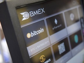 A bitcoin automated teller machine (ATM) stands at the Coin Trader bitcoin retail store in Tokyo, Japan, on Wednesday, Aug. 30, 2017.