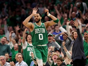 Jayson Tatum #0 of the Boston Celtics celebrates breaking 50 points against the Philadelphia 76ers during the fourth quarter in game seven of the 2023 NBA Playoffs Eastern Conference Semifinals at TD Garden on May 14, 2023 in Boston, Massachusetts.