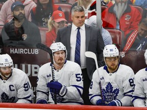 Maple Leafs head coach Sheldon Keefe looks on from the bench against the Florida Panthers during overtime in Game 3 of the second round of the playoffs against the Panthers in Sunrise, Fla., on Sunday, May 7, 2023.