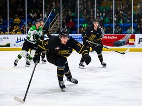Logen Hammett (No. 5) shown in action last season with Brandon Wheat Kings. He was traded to the Vancouver Giants on Friday.