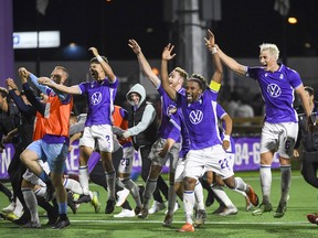 Pacific FC players celebrate theupset the Vancouver Whitecaps at Starlight Stadium in the 2021 Canadian Championship quarterfinals.