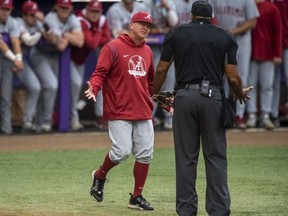 Alabama head coach Brad Bohannon, left, argues with umpire Joe Harris after being tossed from an NCAA college baseball game in the bottom of the second inning against LSU, Saturday, April 29, 2023, in Baton Rouge, Louisiana./The Advocate via AP)