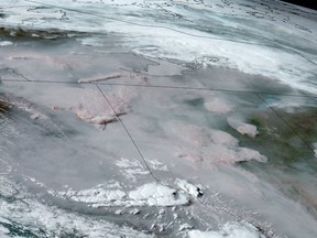 Wildfires and smoke are shown in British Columbia and Alberta in this satellite image taken Thursday, May 18, 2023.