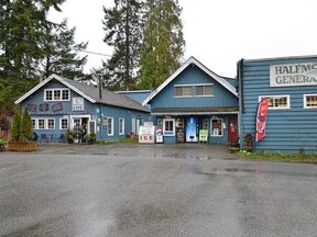 The 1937 Halfmoon Bay General Store (middle) on the Sunshine Coast will be replaced by a new structure. The store will be moving into the former cafe beside the store (left) while the new building goes up.