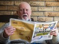 Don Cherry leafs through the latest edition of the Toronto Sun at his home in Mississauga on Monday, May 15, 2023.